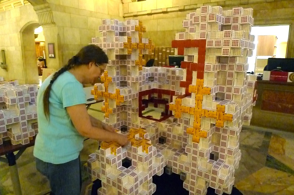 Dr. Jeannine Mosely constructing the Mosely Snowflake Fractal at the University of Southern California Libraries, August 2012.