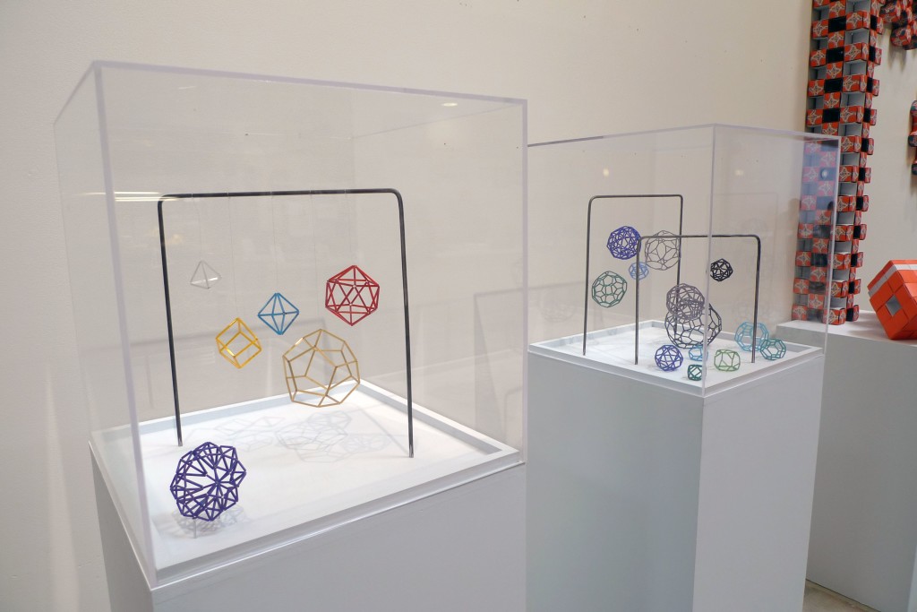 Kathryn Harris's eades representations of the 5 Platonic solids (left) and the 13 Archimedean solids (right).