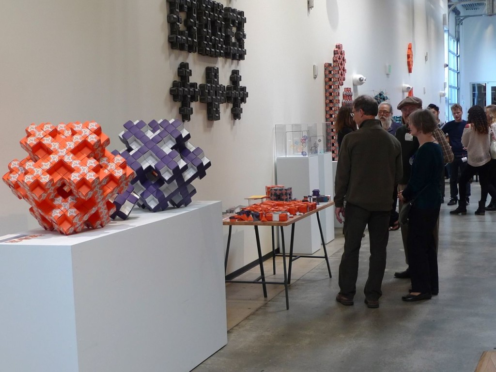 Making Space exhibition at Google. At left, two Level Two Mosely Snowflake Sponge fractals, folded by Christina Simons and Margaret Wertheim, from an original design by Dr. Jeannine Mosely.